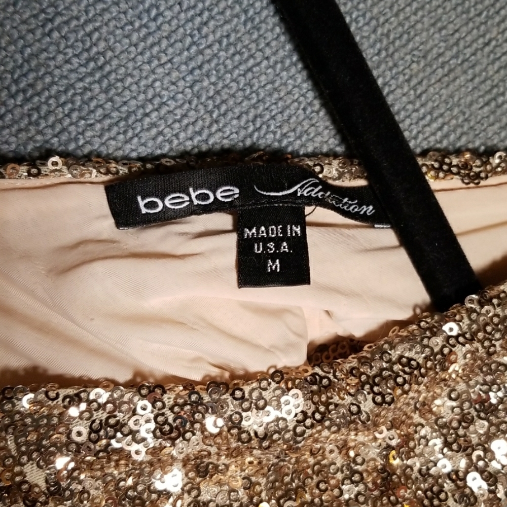 Sequin bebe dress with sheer inserts